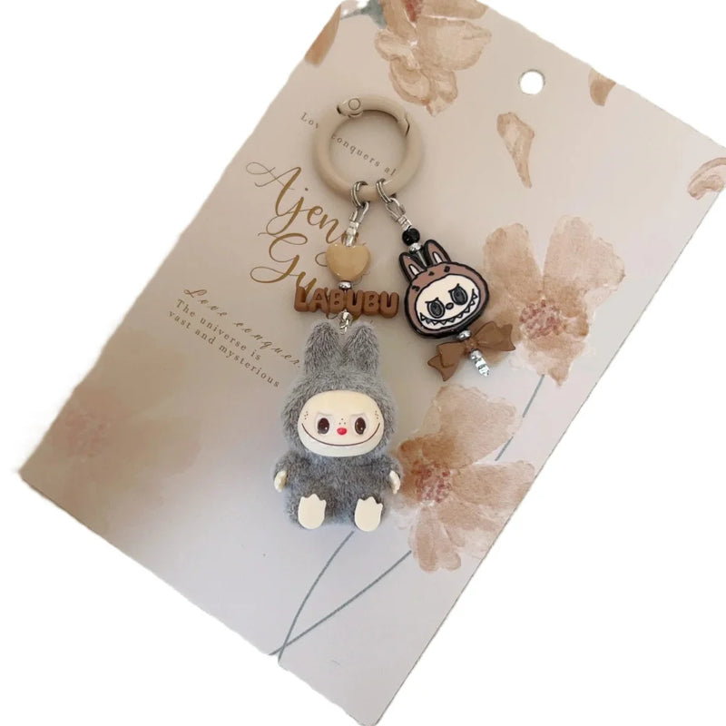 Porte-clé Labubu gris-MaPelucheLabubu.fr | Adoptez votre Labubu : Peluches et Figurines Uniques