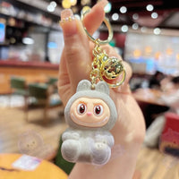 Découvrir le modèle GRAY / 5.5cm Porte-clé Mini Labubu - modèle GRAY / 5.5cm - MaPelucheLabubu.fr | Adoptez votre Labubu : Peluches et Figurines Uniques