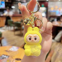 Découvrir le modèle Yellow / 5.5cm Porte-clé Mini Labubu - modèle Yellow / 5.5cm - MaPelucheLabubu.fr | Adoptez votre Labubu : Peluches et Figurines Uniques