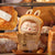 Figurine Labubu The Monster Almost Hidden Series Blind Box - modèle Bread Bag - MaPelucheLabubu.fr | Adoptez votre Labubu : Peluches et Figurines Uniques