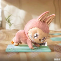 Figurines The Monster Lazy Yoga Americano - modèle Ab Roller - MaPelucheLabubu.fr | Adoptez votre Labubu : Peluches et Figurines Uniques