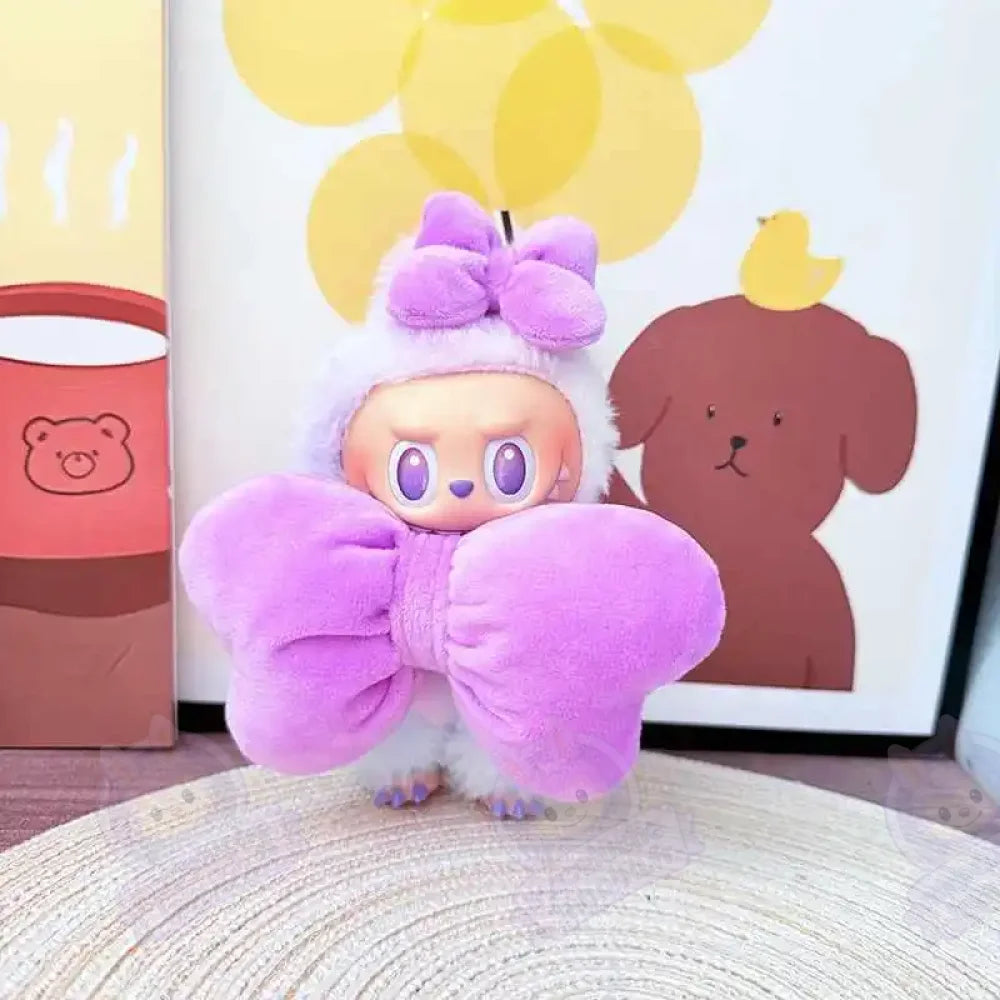 Nœud papillon et ailes rouge Labubu-MaPelucheLabubu.fr | Adoptez votre Labubu : Peluches et Figurines Uniques