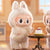 Peluche Labubu Sea Salt Cocount - modèle Figurine Labubu - Lait de Soja blanc - MaPelucheLabubu.fr | Adoptez votre Labubu : Peluches et Figurines Uniques