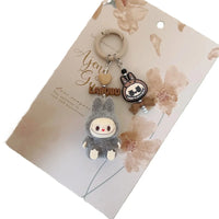 Porte-clé Labubu gris-MaPelucheLabubu.fr | Adoptez votre Labubu : Peluches et Figurines Uniques